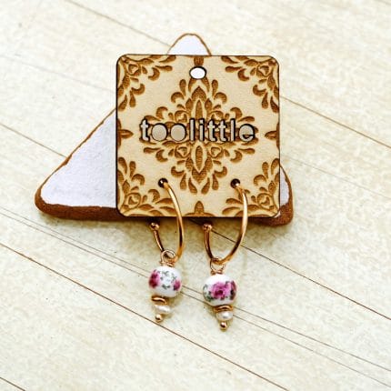 Κρίκοι με κεραμικές φλοράλ χάντρες